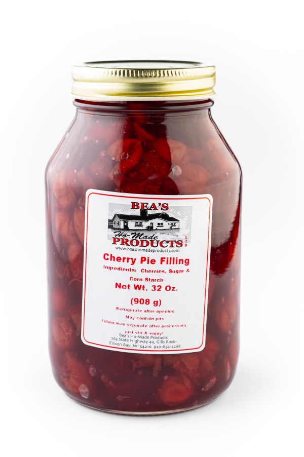 Quart jar of cherry pie filling. Red and luscious.