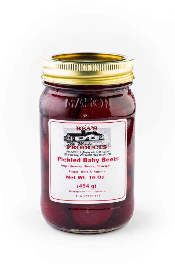 Pint jar of pickled baby beets.