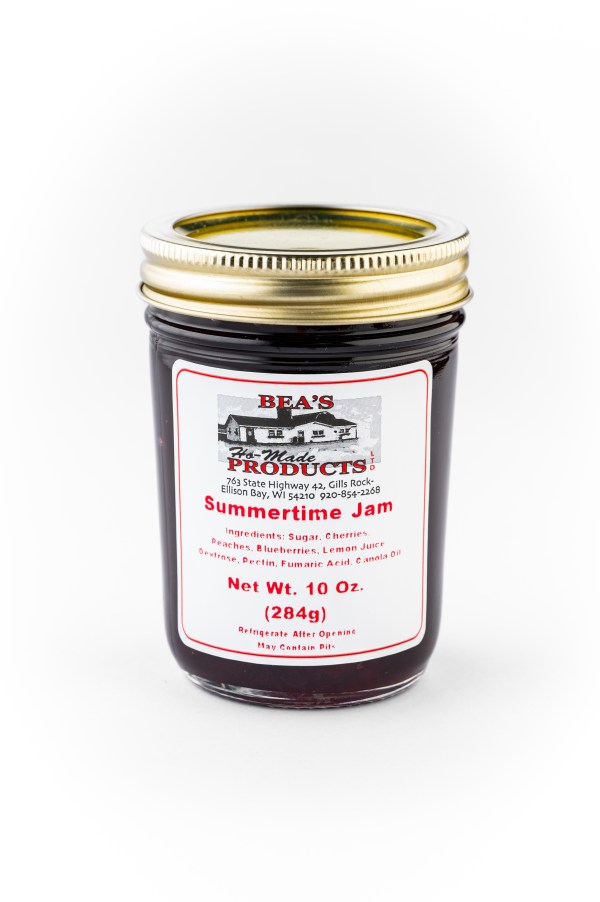 10 ounce jar of summertime jam, which is made with cherries, peaches, and blueberries